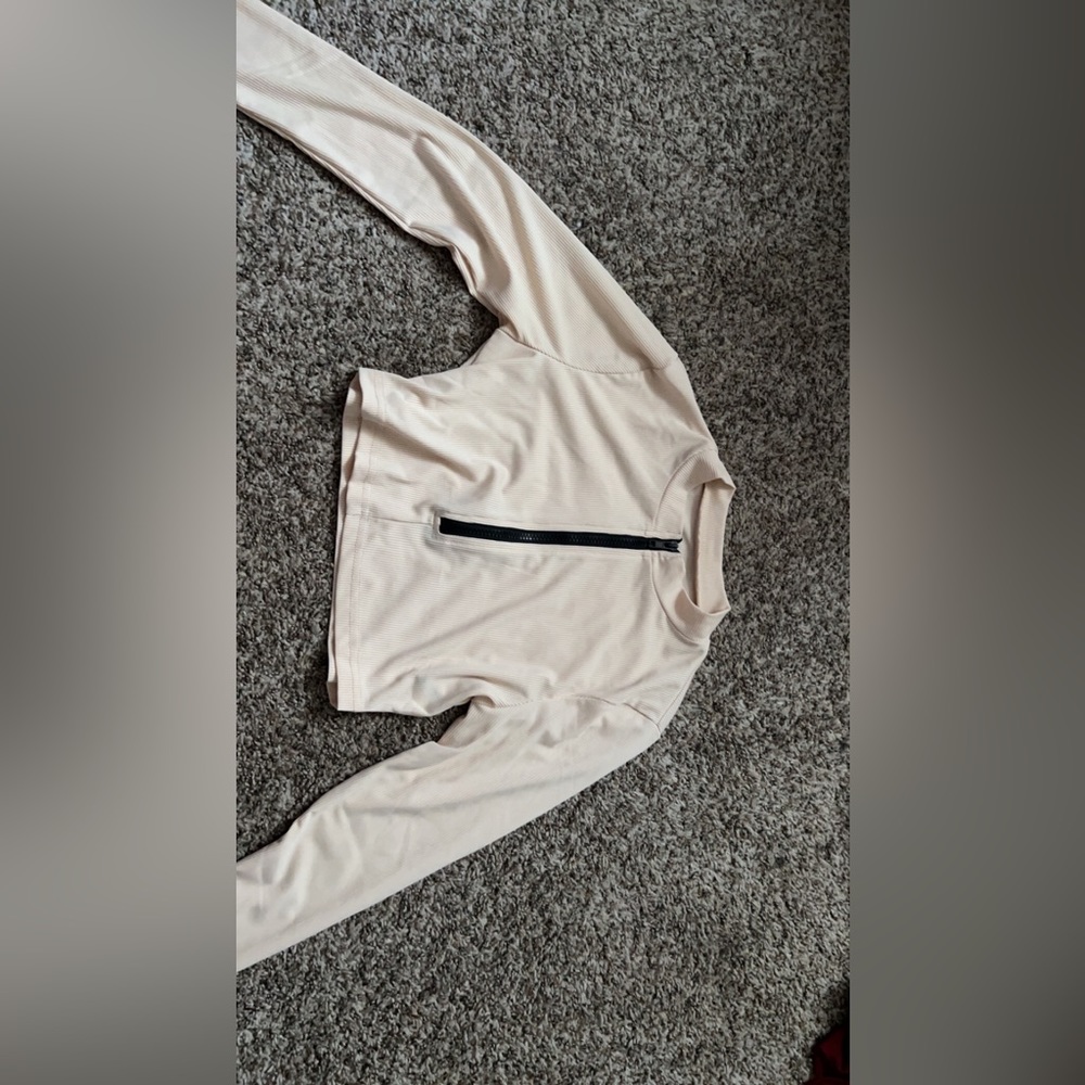 Cropped zip up from Blush Mark in a size small.